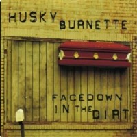 husky-burnette-facedown-in-the-dirt